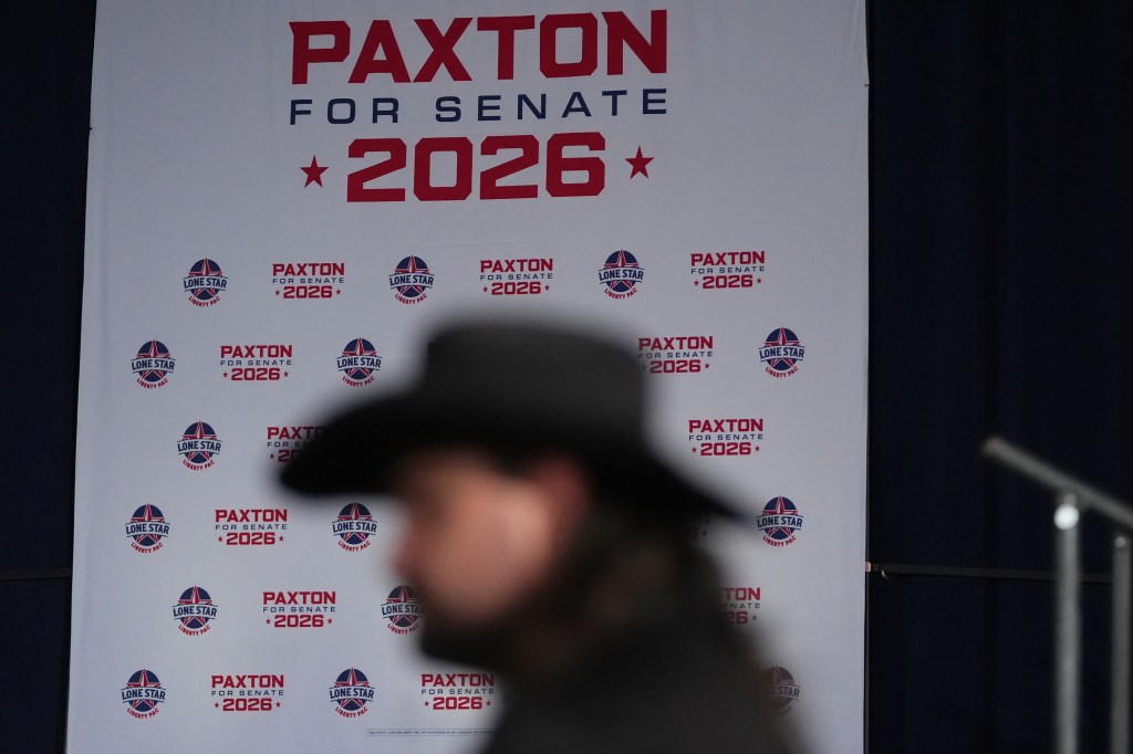 An attendee waits for the festivities at a primary night election watch party for Texas Attorney General Ken Paxton, a Republican candidate for the U.S. Senate, on Tuesday, March 3, 2026, in Dallas.