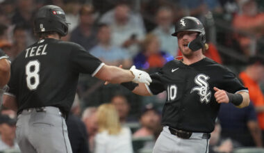 Chicago White Sox's Chase Meidroth (10) celebrates with Kyle Teel (8) after scoring off a 2-run single hit by by Sam Antonacci during the second inning in Game 1 of baseball's American League Wild Card Series against the Houston Astros, Tuesday, Sept. 29, 2026, in Houston.