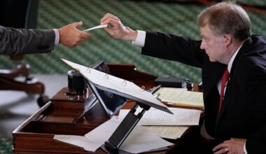 Texas state Sen. Brian Birdwell acting as a juror votes on the articles of impeachment against suspended Texas Attorney General Ken Paxton in the Senate Chamber at the Texas Capitol, Saturday, Sept. 16, 2023, in Austin, Texas. (AP Photo/Eric Gay)