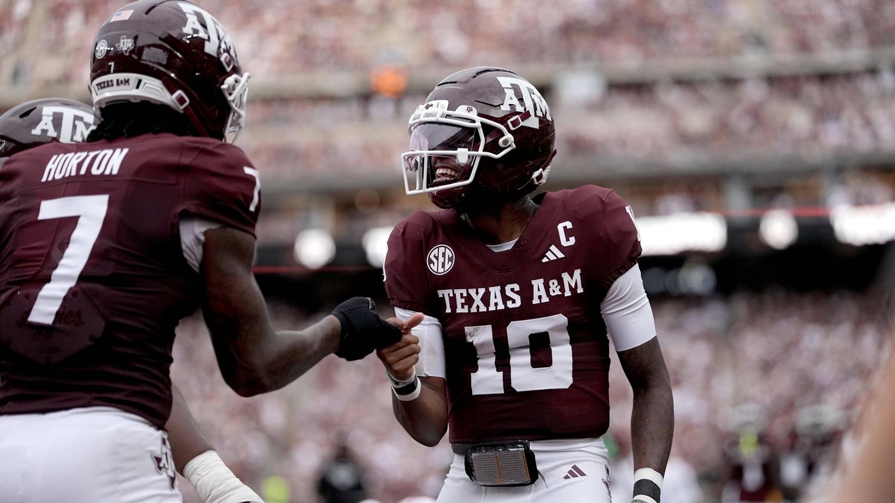 Texas A&M quarterback Marcel Reed (10) reacts with teammate Isaiah Horton (7) after a touchdown against Missouri State during the first quarter of an NCAA college football game Saturday, Sept. 5, 2026, in College Station, Texas. (AP Photo/Sam Craft)