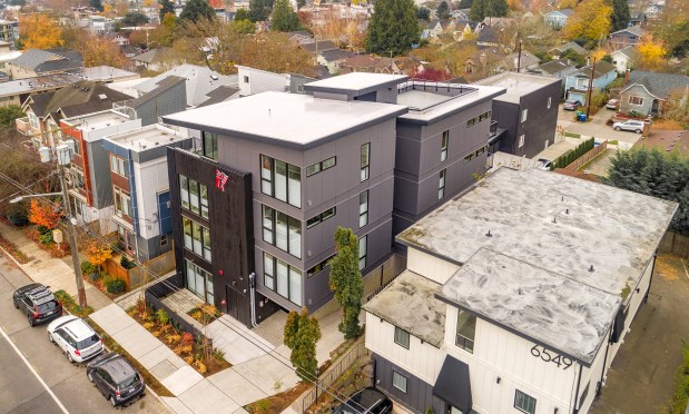 Seattle's Juniper Flats, developed in 2023, has four units per floor, all connected by a single staircase. (Build LLC)