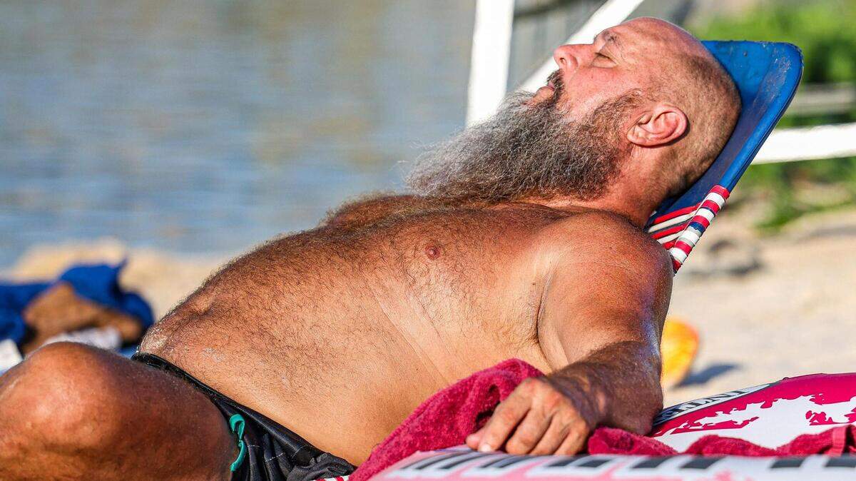 David Hume sunbathes on the water during the heatwave for the Rockin’ The River Live on the Trinity Concert event at the Panther Island Pavilion in Fort Worth on Thursday, July 13, 2023. David Hume sunbathes on the water during the heatwave for the Rockin’ The River Live on the Trinity Concert event at the Panther Island Pavilion in Fort Worth on Thursday, July 13, 2023.