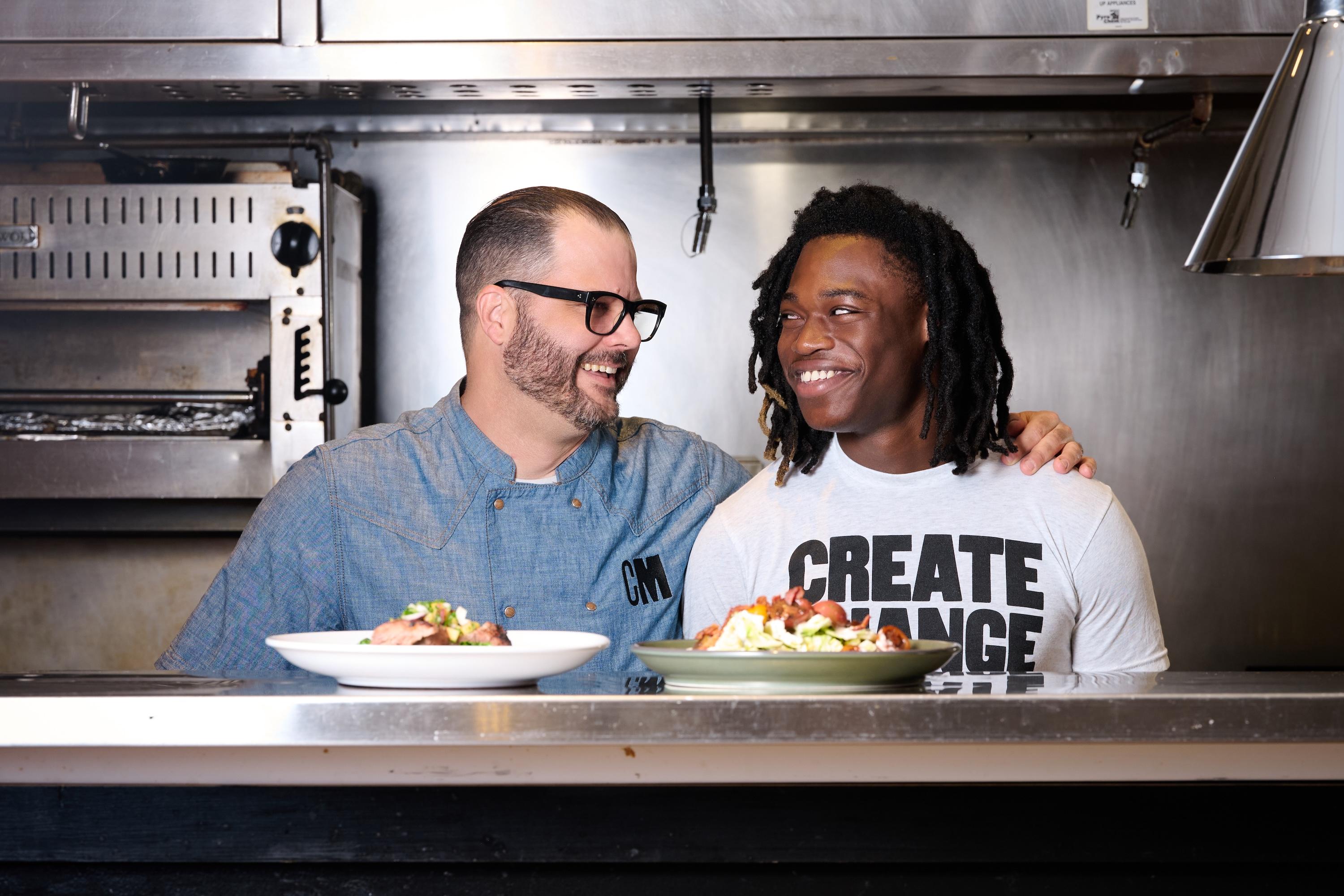 Chad House and an intern at Cafe Momentum