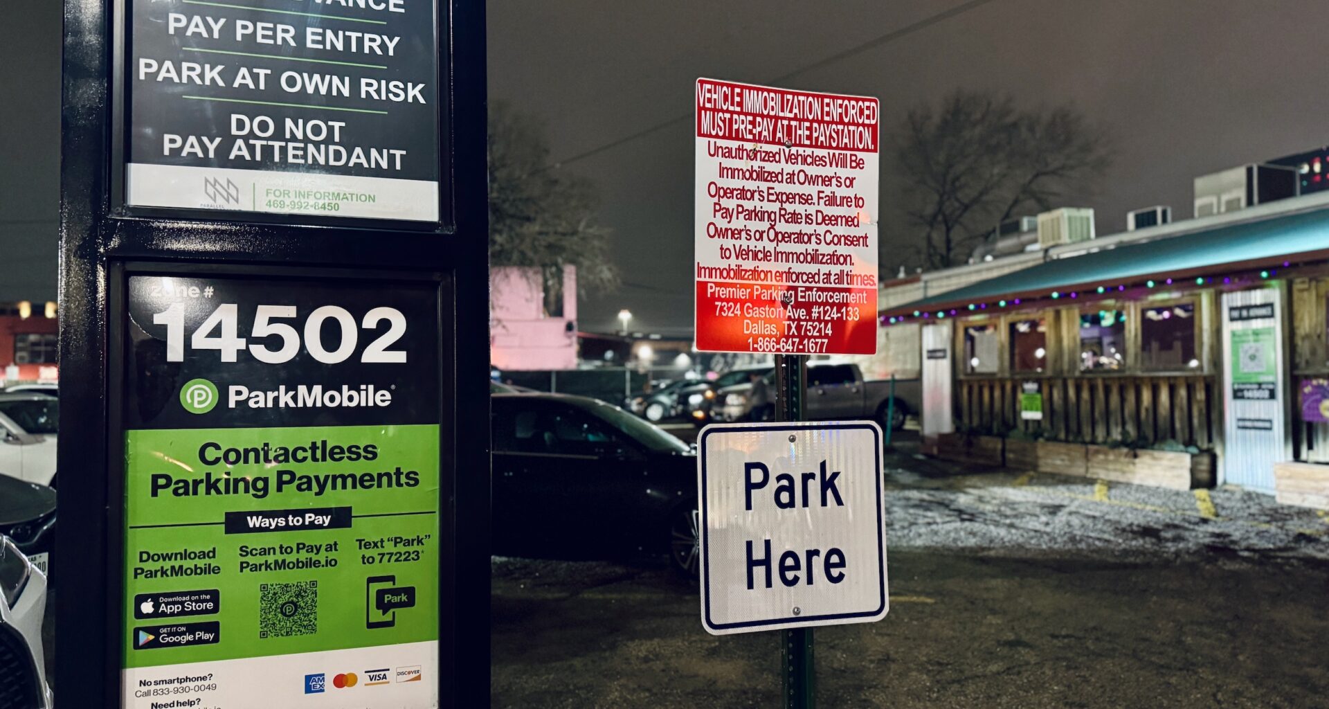 a parking lot sign in Deep Ellum