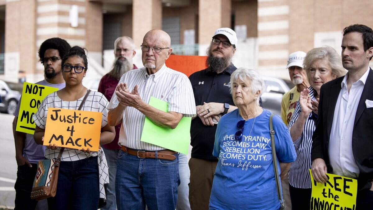 Community members gather outside of the Tarrant County Corrections Center to raise awareness and demand justice after four people died in 11 days in custody or immediately after being released from the Tarrant County Jail on Tuesday, July 14, 2026 in Fort Worth.