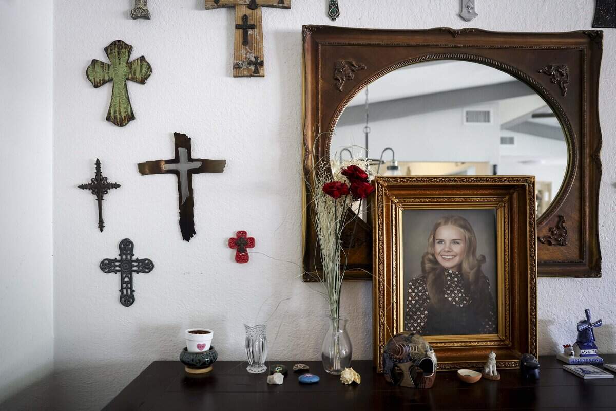 A photo of Carla Walker honors her memory at the home of her brother, Jim Walker, on Tuesday, July 7, 2026 in Fort Worth. Jim Walker is advocating for the Carla Walker Act, that establish funding for the use of Forensic Genetic Genealogy DNA analysis to solve unsolved crimes and identify human remains.