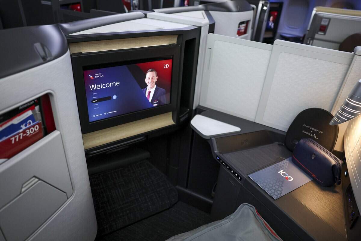 American Airlines flagship suite seats are outfitted with more personal storage space, privacy doors and a chaise lounge seating position on its new retrofitted Boeing 777-300ER aircraft, on Wednesday, Sept. 2, 2026 at Dallas Fort Worth International Airport.