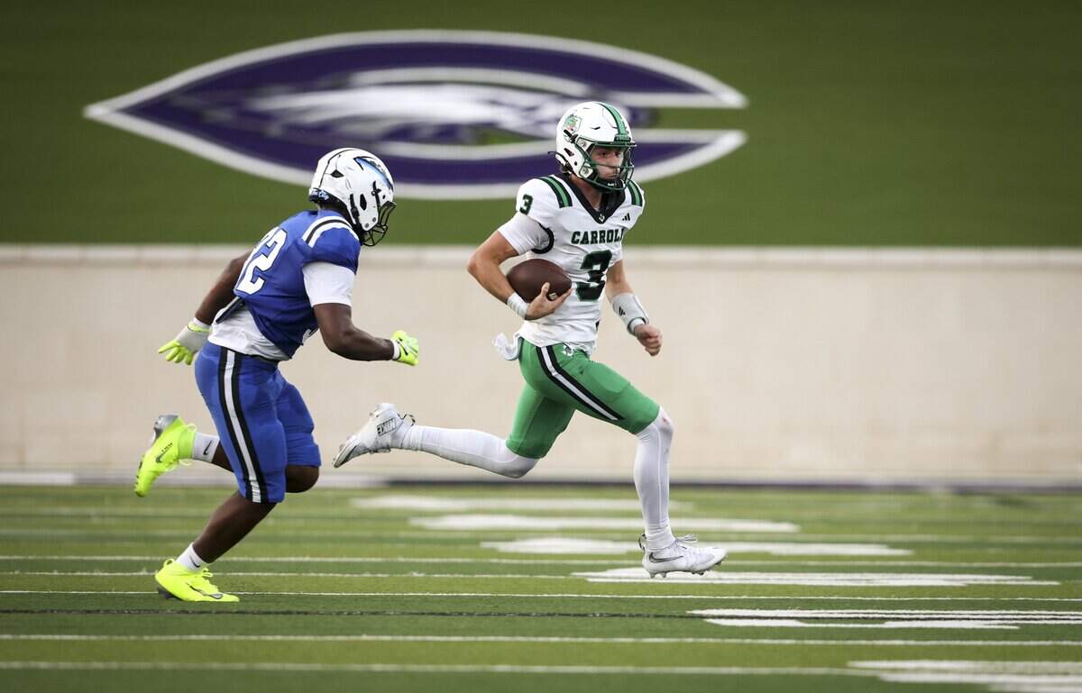 Southlake Carroll quarterback Hudson Tomcheck (3) runs the ball during the first half of the game against North Crowley on Friday, Sept. 4, 2026 at Crowley ISD Stadium in Fort Worth.
