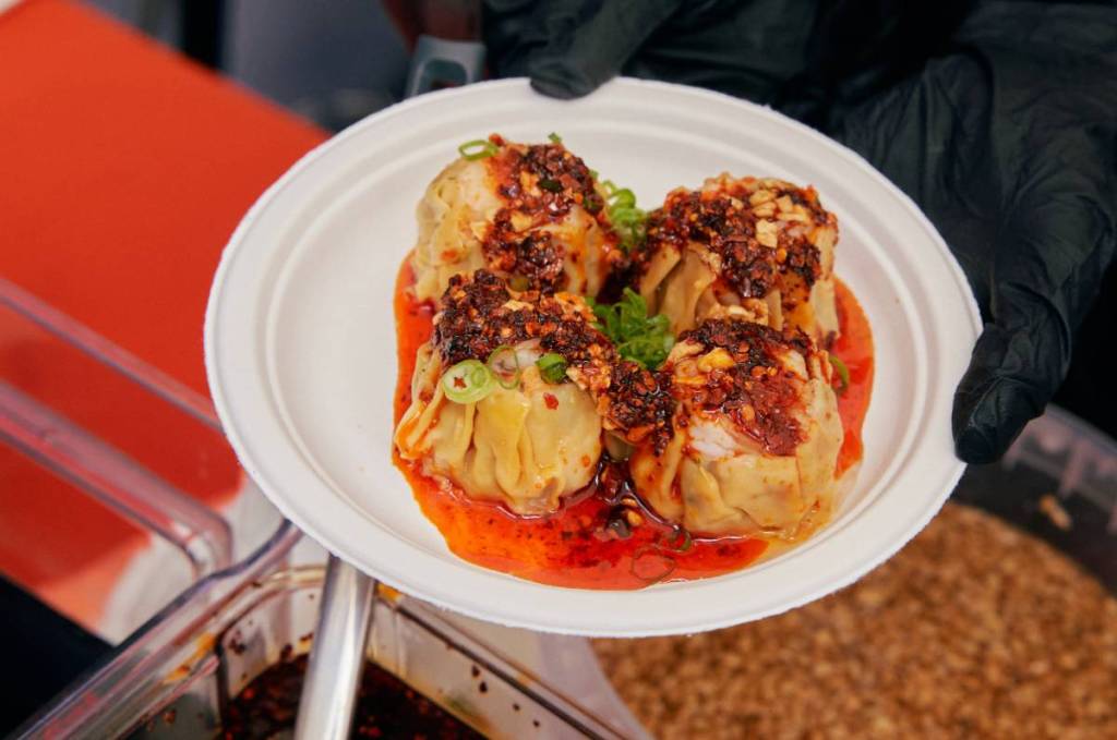 Image shows a plate of Chinese-style dumplings. 