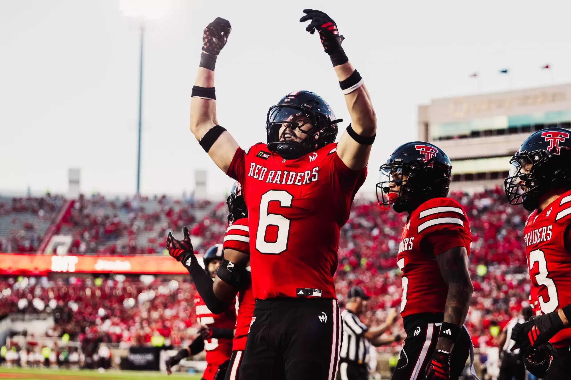 John Curry celebrates interception versus Abilene Christian