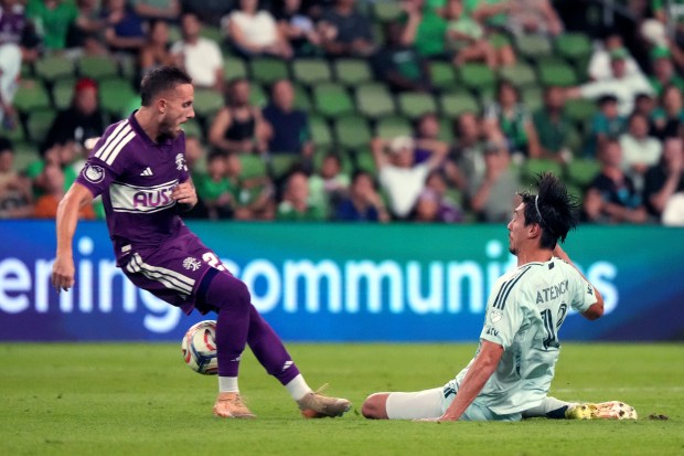 Josh Atencio #12 of the Colorado Rapids and Zan Kolmanic #23 of Austin FC battle for the ball during the second half at Q2 Stadium on September 9, 2026 in Austin, Texas. (Photo by Scott Wachter/Getty Images)