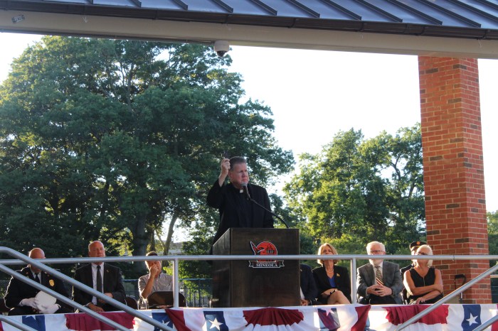 Malcom Burns Pastor from Corpus Christi Church showed the crowd a cross made of steel from the World Trade Center.