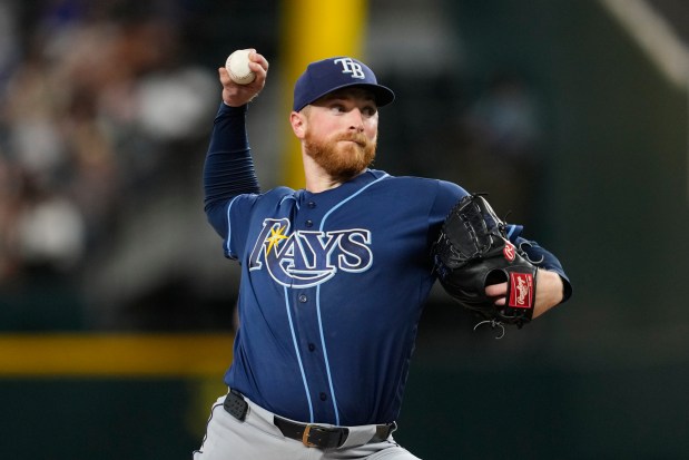 Tampa Bay Rays pitcher Drew Rasmussen throws to the Texas Rangers during the third inning of a baseball game Saturday, Sept. 5, 2026, in Arlington, Texas. (AP Photo/Tony Gutierrez)