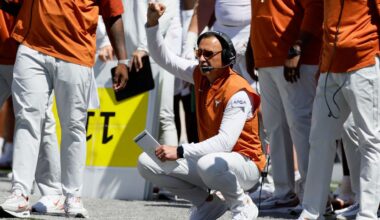 Texas head coach Steve Sarkisian signals to his players during the first half of an NCAA college football game against Ohio State, Saturday, Aug. 30, 2025, in Columbus, Ohio. (AP Photo/Jay LaPrete)