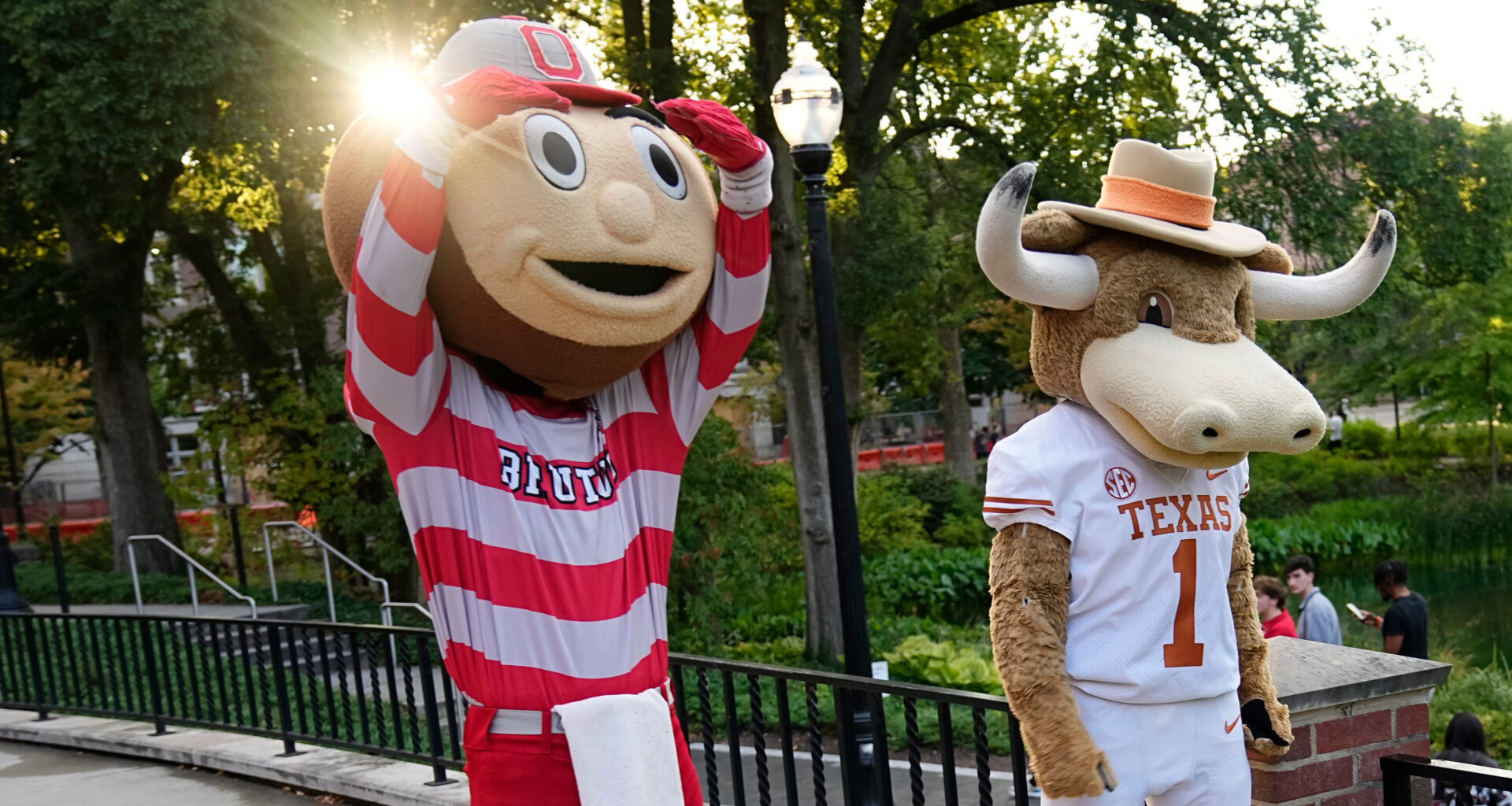 Ohio State mascot, Brutus, and University of Texas mascot, Hook 'Em, interact during a filming of the Joel Klatt Show on Ohio
