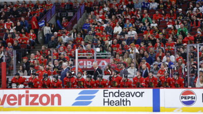 Nov 15, 2025; Chicago, Illinois, USA; Fans watch an NHL game between the Chicago Blackhawks and Toronto Maple Leafs during the first period at United Center.