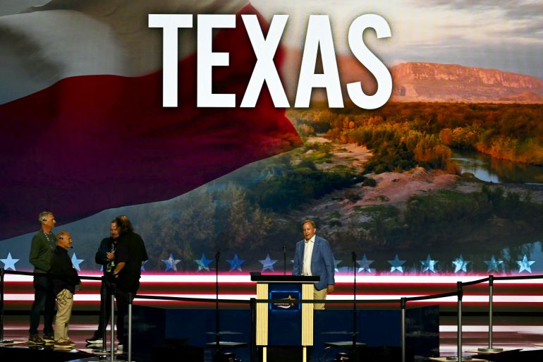 Texas Attorney General and US Senate candidate Ken Paxton (R) walks onto the stage of the American Airlines Center during preparations ahead of the Republican National Committee (RNC) Midterm Convention in Dallas, Texas on September 8, 2026.