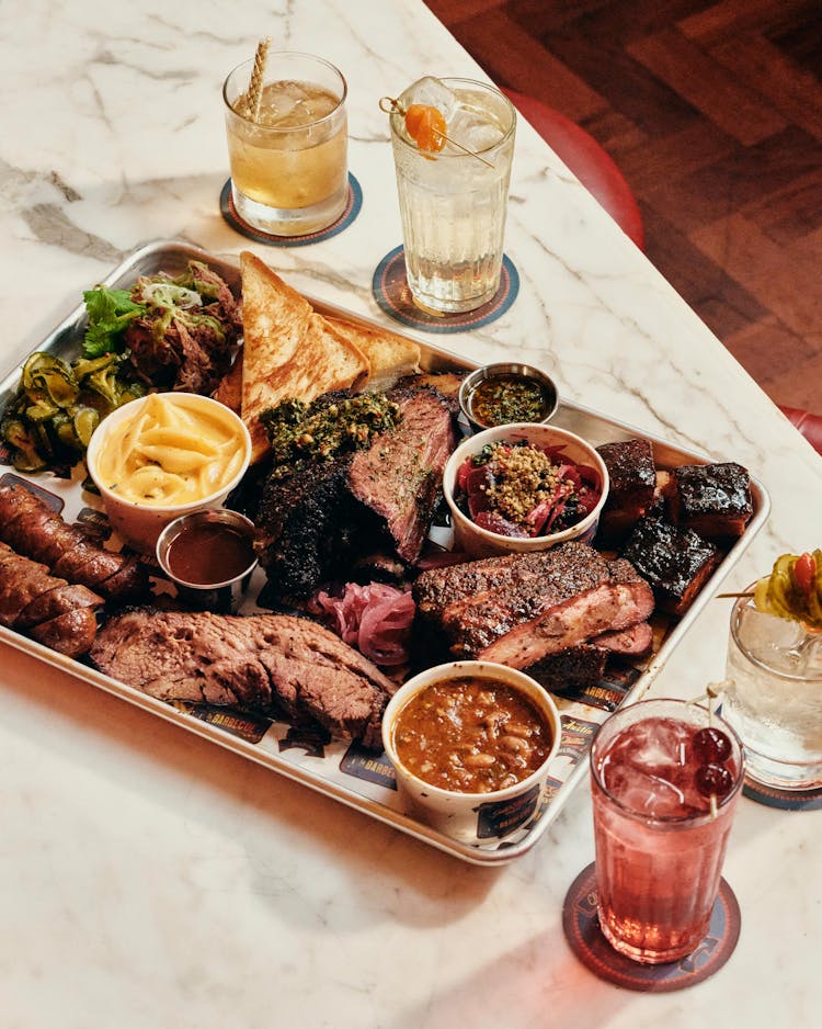 photo of barbecue tray and drinks