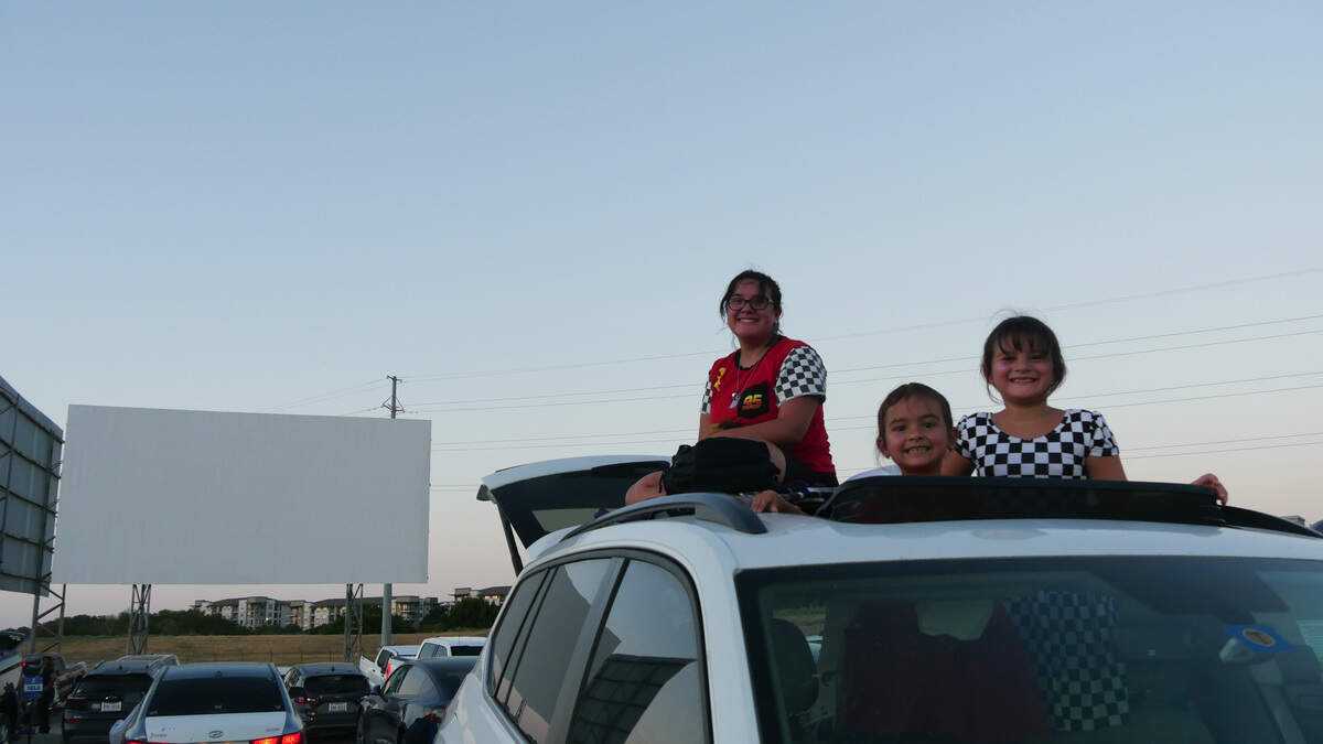 Siblings Everly, Mila, and Alta cozied up to watch the 20th anniversary release of ‘Cars’ on Sept. 7 at the closing night of the Coyote-Drive In theater in Fort Worth. Siblings Everly, Mila, and Alta cozied up to watch the 20th anniversary release of ‘Cars’ on Sept. 7 at the closing night of the Coyote-Drive In theater in Fort Worth.