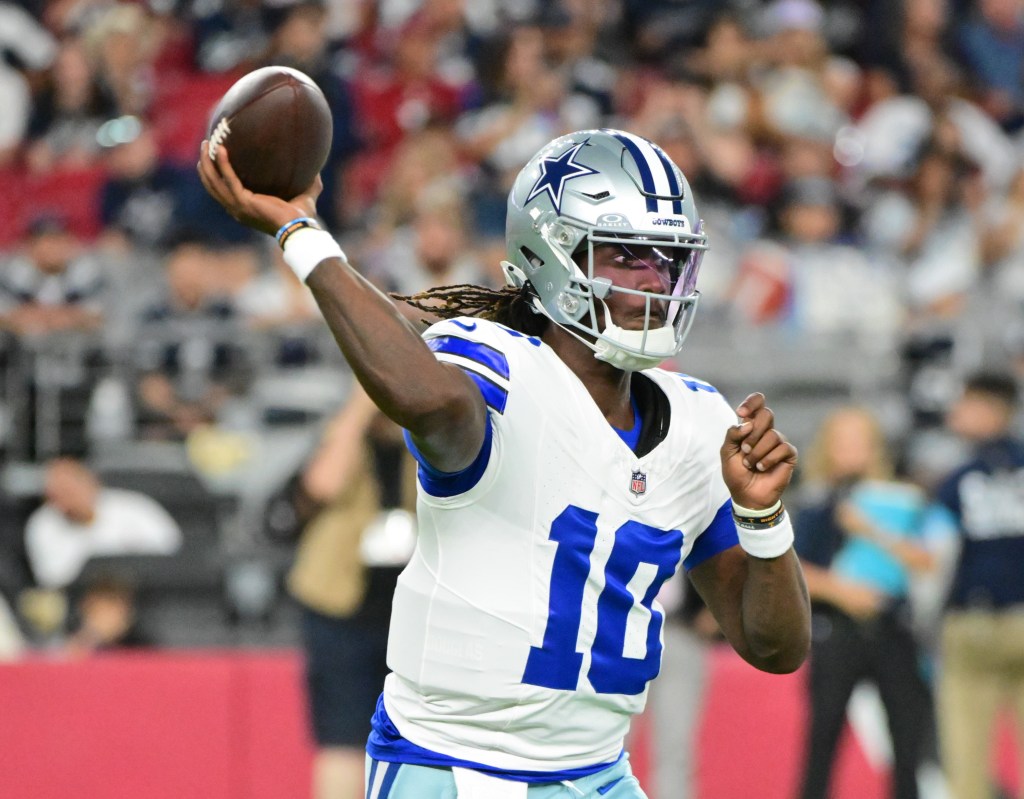 Dallas Cowboys quarterback Joe Milton III throws a pass.
