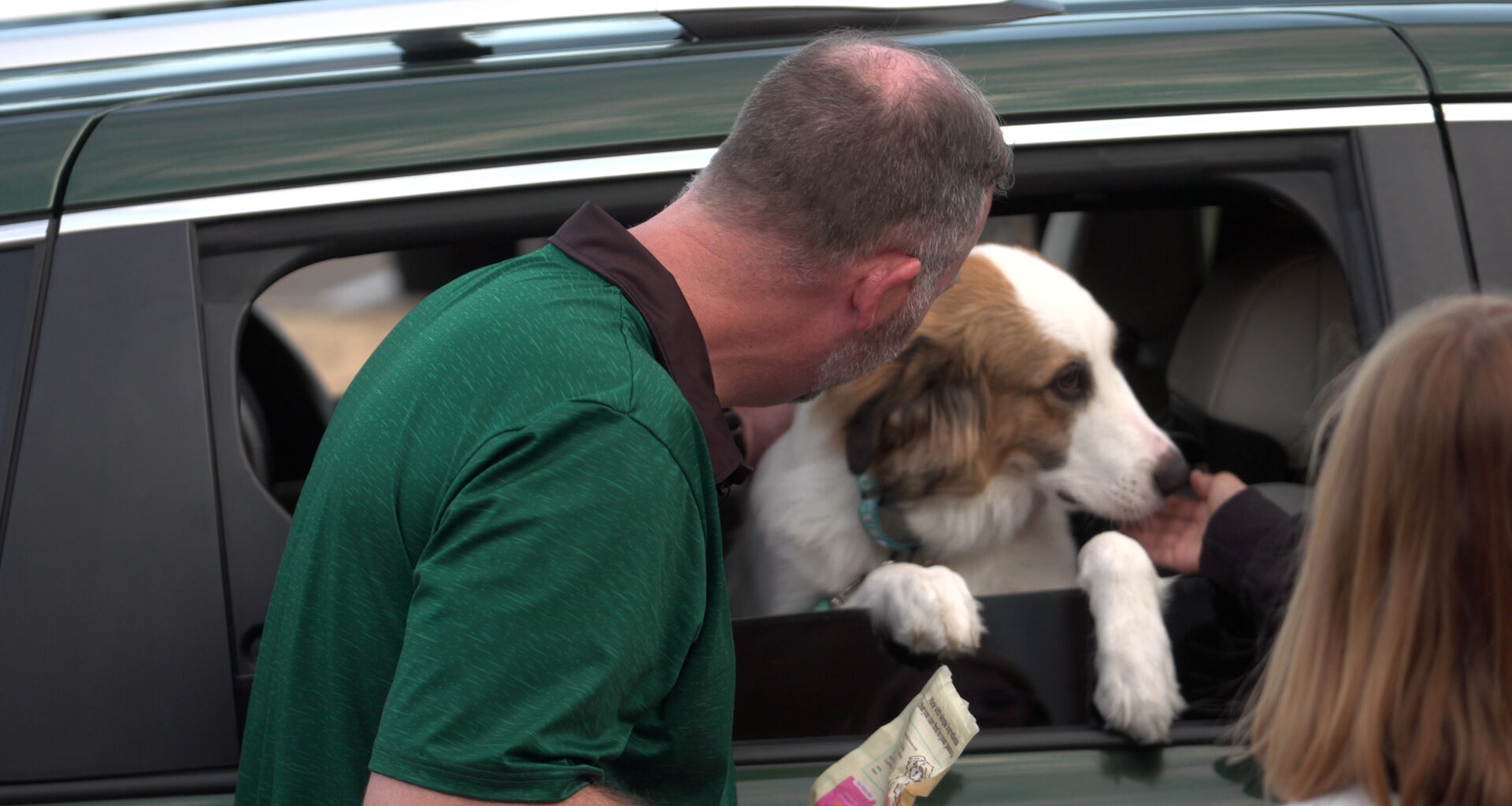 Dog-loving principal turns a Benbrook elementary school's drop-off line into puppy paradise