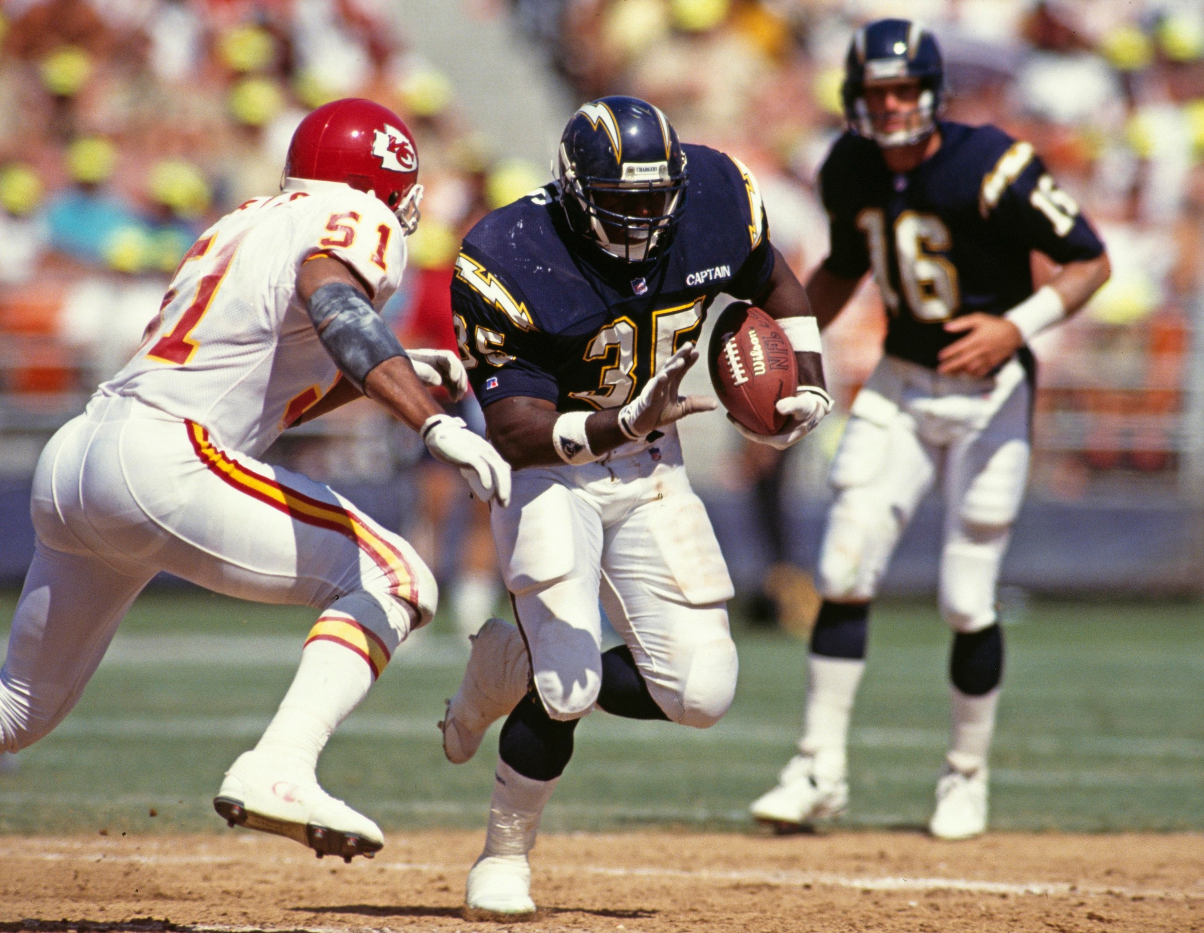 Marion Butts #35, Running Back for the San Diego Chargers runs the ball against the Kansas City Chiefs during their American Football Conference West game on 6 September 1992 at the Jack Murphy Stadium, San Diego, California, United States. The Chiefs won the game 24 - 10. (Photo by Stephen Dunn/Allsport/Getty Images)