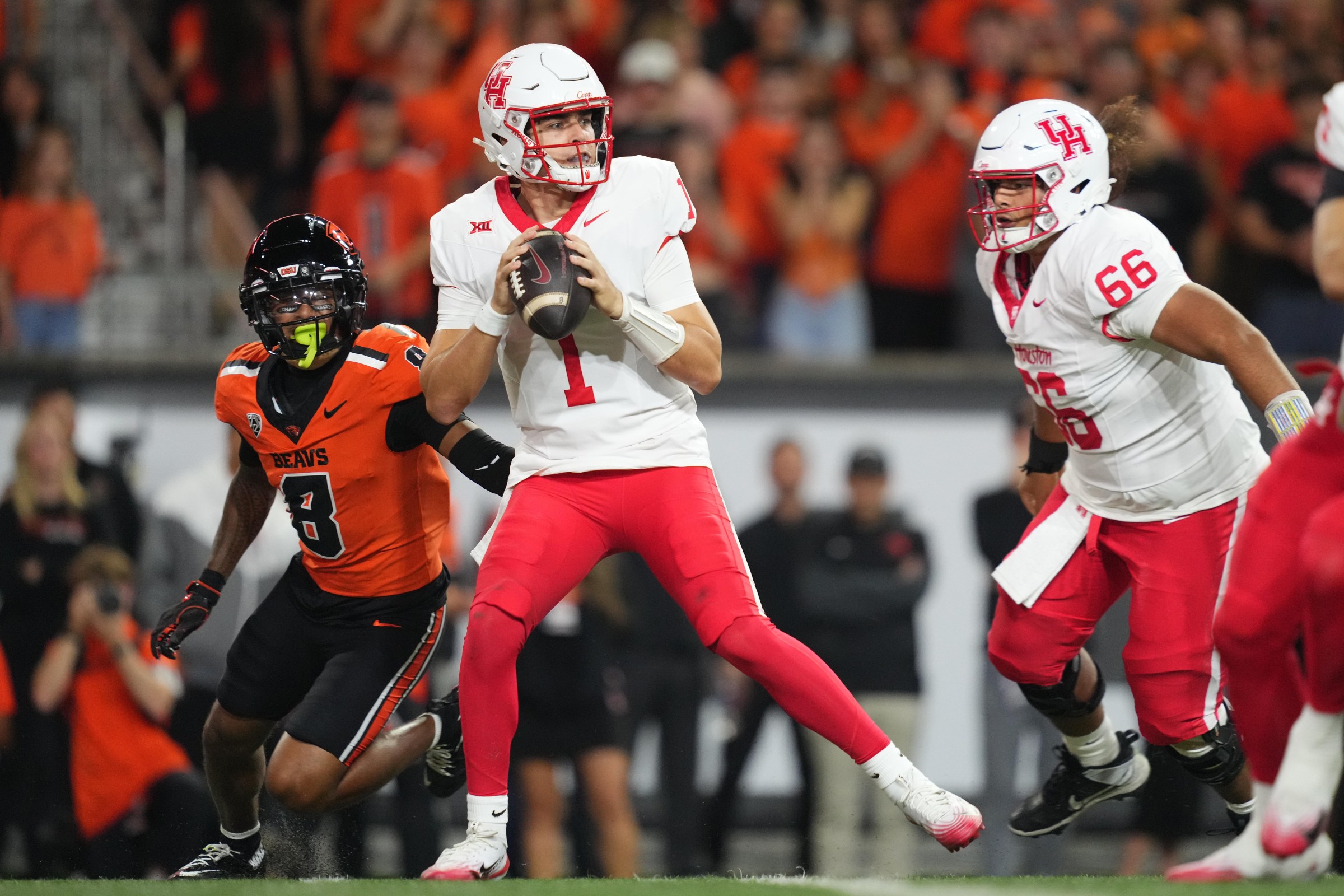 CORVALLIS, OREGON - SEPTEMBER 26: Conner Weigman #1 of the Houston Cougars looks to throw during the first half against the Oregon State Beavers at Reser Stadium on September 26, 2025 in Corvallis, Oregon. (Photo by Soobum Im/Getty Images)