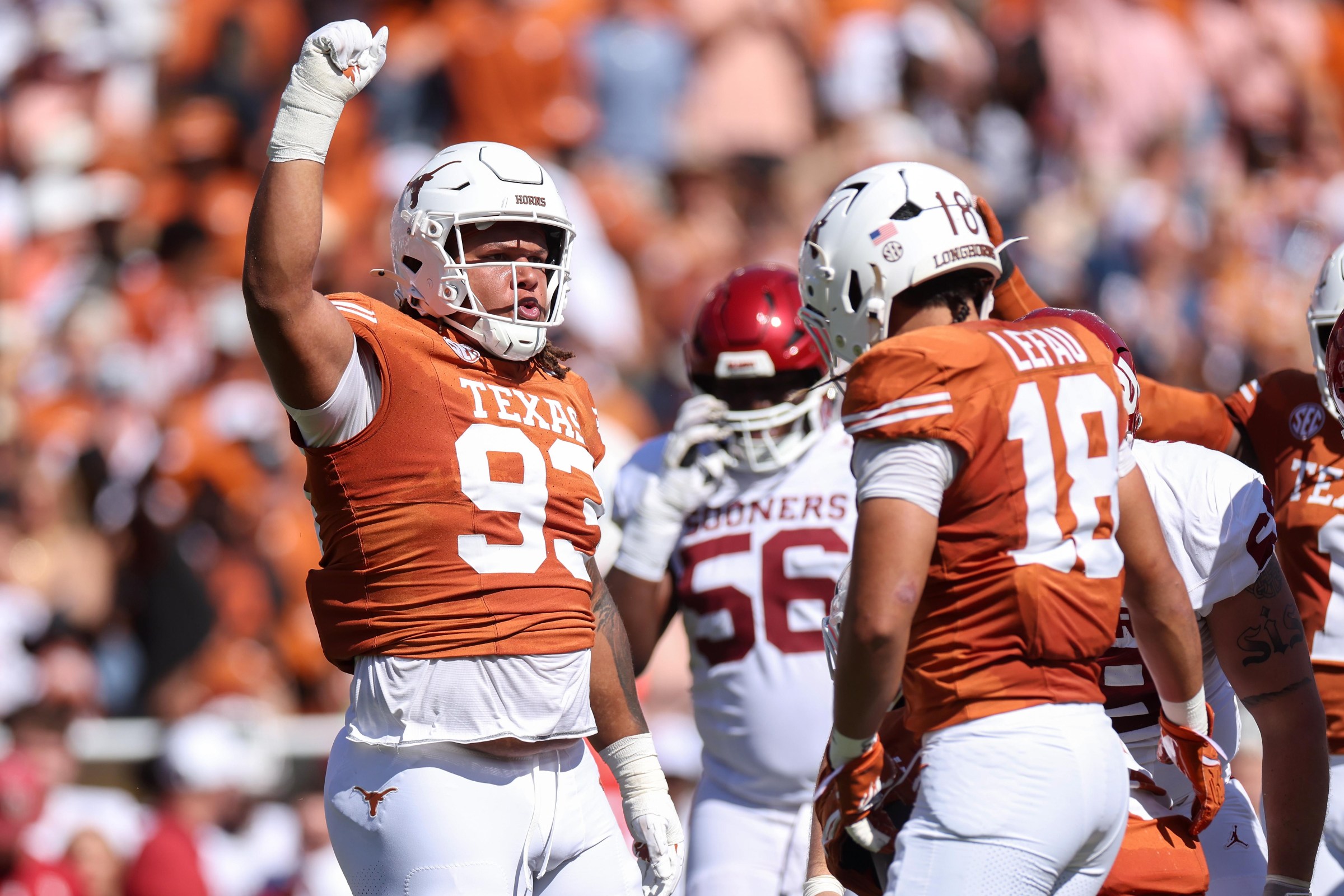 DALLAS, TEXAS - OCTOBER 11: Hero Kanu #93 of the Texas Longhorns reacts after a tackle in the first half against the Oklahoma Sooners at Cotton Bowl on October 11, 2025 in Dallas, Texas. (Photo by Tim Warner/Getty Images)