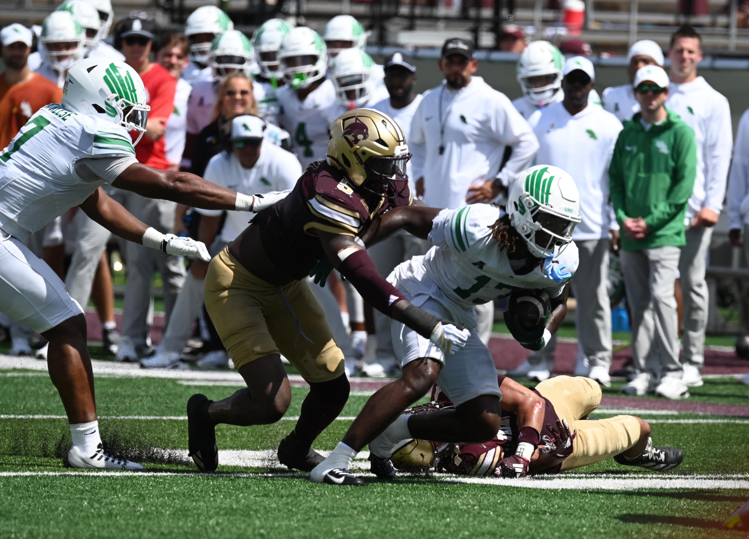 SAN MARCOS, TX - SEPTEMBER 19: North Texas Mean Green WR Justin Stevenson (13) is tackled by Texas State Bobcats DE Jo’Laison Landry (6) during game featuring the North Texas Mean Green and the Texas State Bobcats on September 19, 2026 at UFCU Stadium in San Marcos, TX. (Photo by John Rivera/Icon Sportswire via Getty Images)
