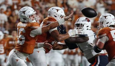 AUSTIN, TX - SEPTEMBER 19: Quarterback Arch Manning #16 of the Texas Longhorns winces as he makes a shovel pass during the college football game between the Texas Longhorns and UTSA Roadrunners on September 19, 2026, at Darrell K Royal-Texas Memorial Stadium in Austin, TX. (Photo by David Buono/Icon Sportswire via Getty Images)