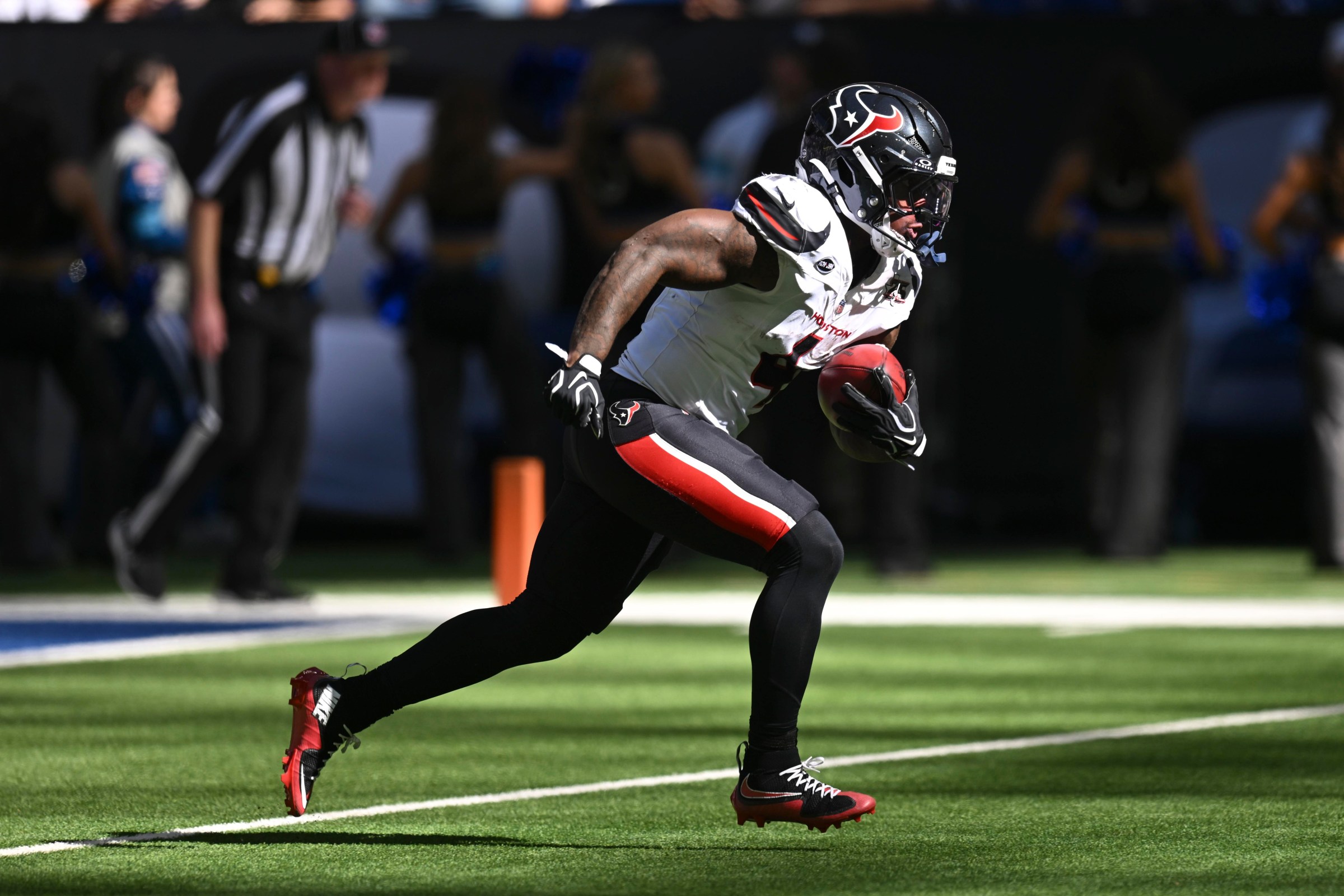 INDIANAPOLIS, IN - SEPTEMBER 27: Houston Texans running back Woody Marks (4) returns a kick during the NFL game between the Houston Texans and the Indianapolis Colts on September 27, 2026, at Lucas Oil Stadium in Indianapolis, Indiana. (Photo by Michael Allio/Icon Sportswire via Getty Images)