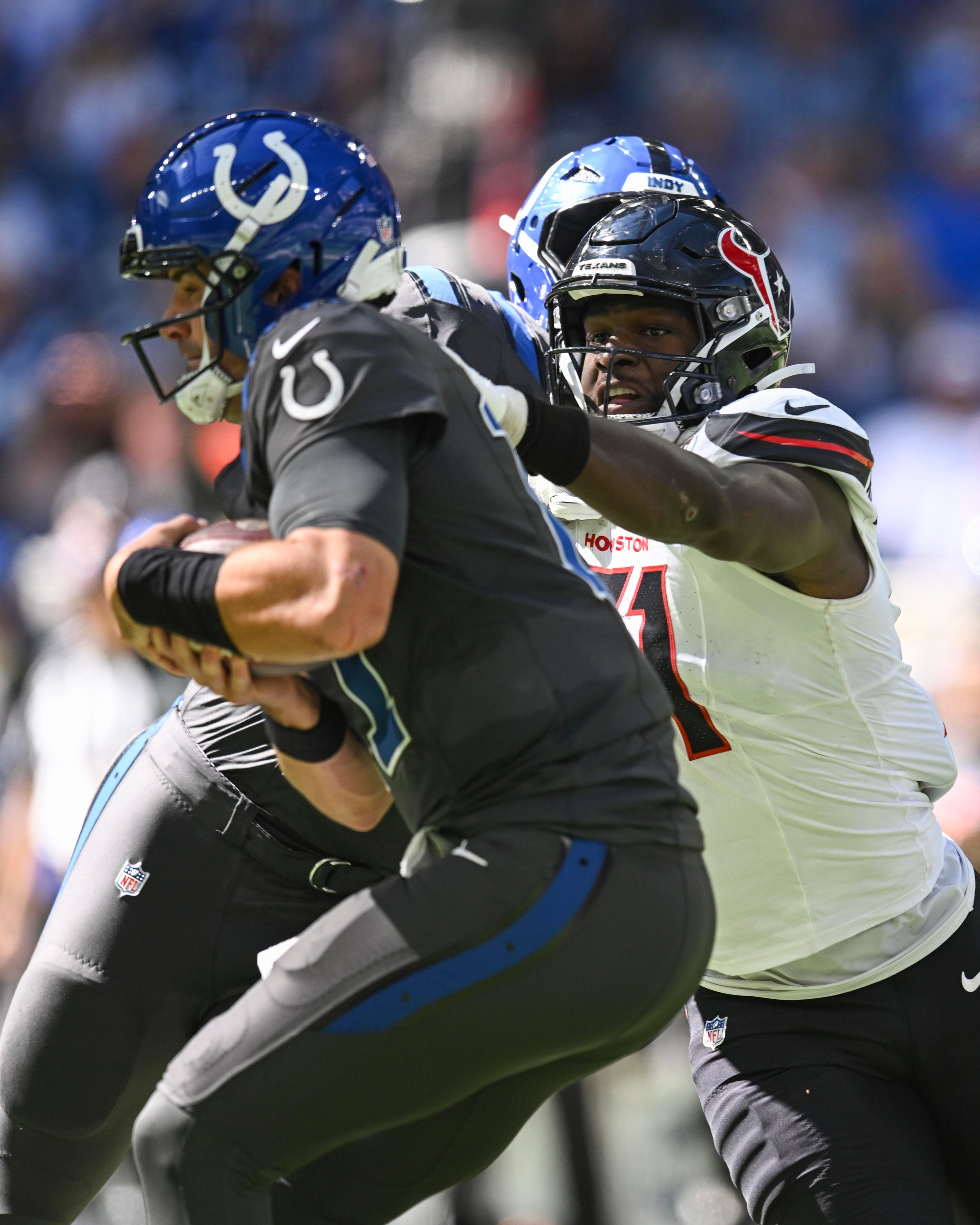 INDIANAPOLIS, IN - SEPTEMBER 27: Houston Texans defensive end Will Anderson Jr. (51) gets a hand on Indianapolis Colts quarterback Daniel Jones (17) during the NFL game between the Houston Texans and the Indianapolis Colts on September 27, 2026, at Lucas Oil Stadium in Indianapolis, Indiana. (Photo by Michael Allio/Icon Sportswire via Getty Images)