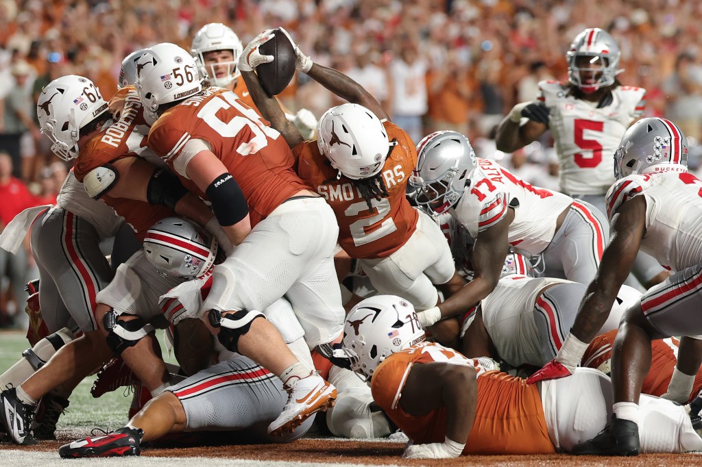 Texas Longhorns player Hollywood Smothers (2) scores a touchdown against the Ohio State Buckeyes.