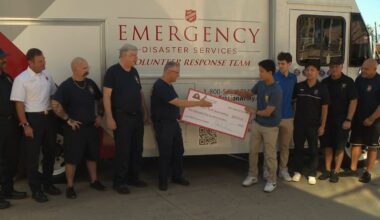 Students present donation for Dallas first responders