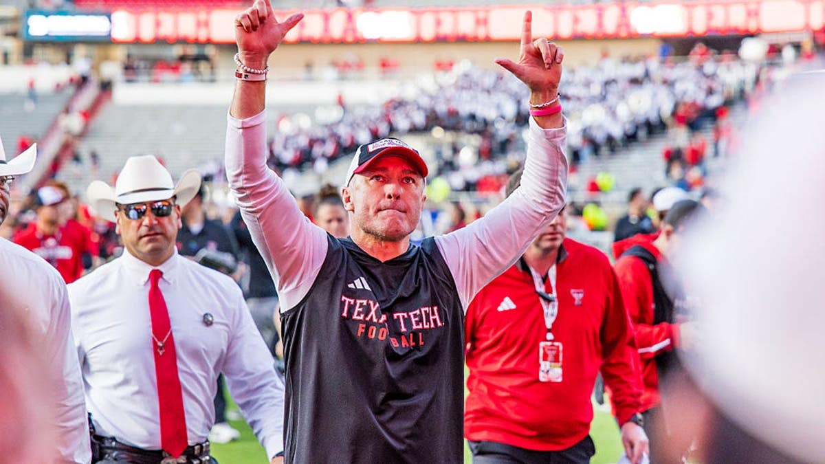 Head Coach Joey McGuire of Texas Tech Red Raiders walking off the field at Jones AT&T Stadium.