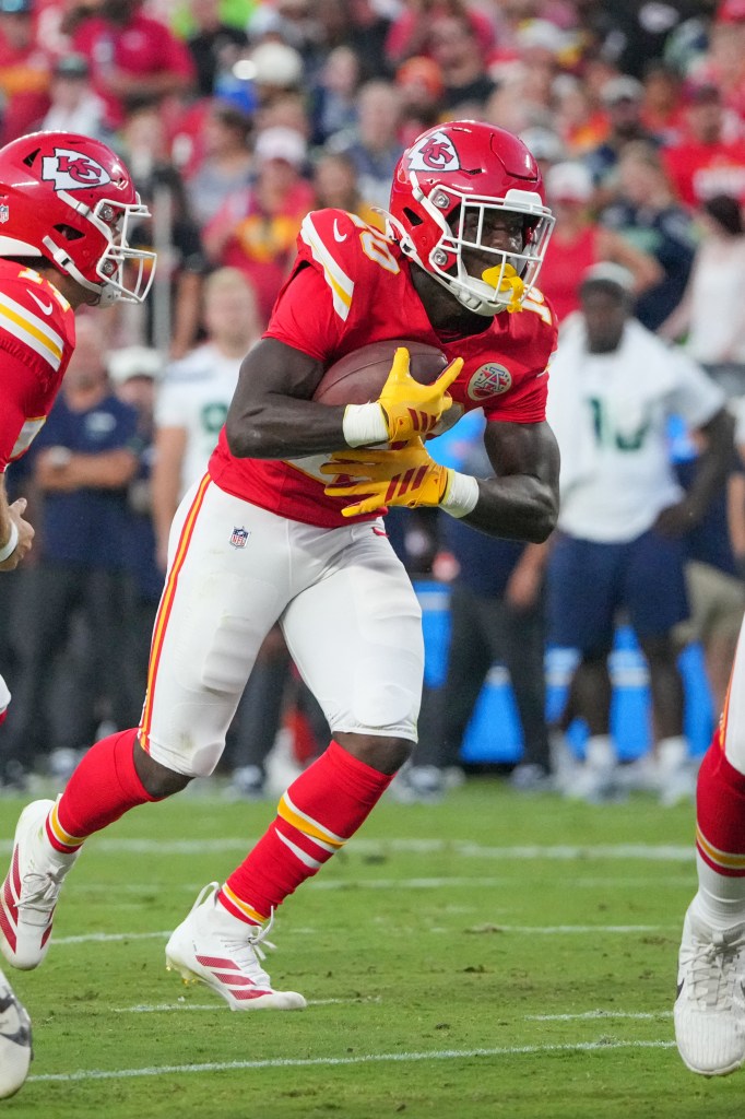 Kansas City Chiefs running back Emari Demercado (25) runs with the ball.