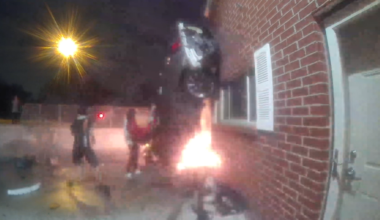 Video shows rescue after car crashes into building, catches fire in Dallas