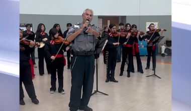 Safety officer's surprise mariachi performance stuns Carroll High students