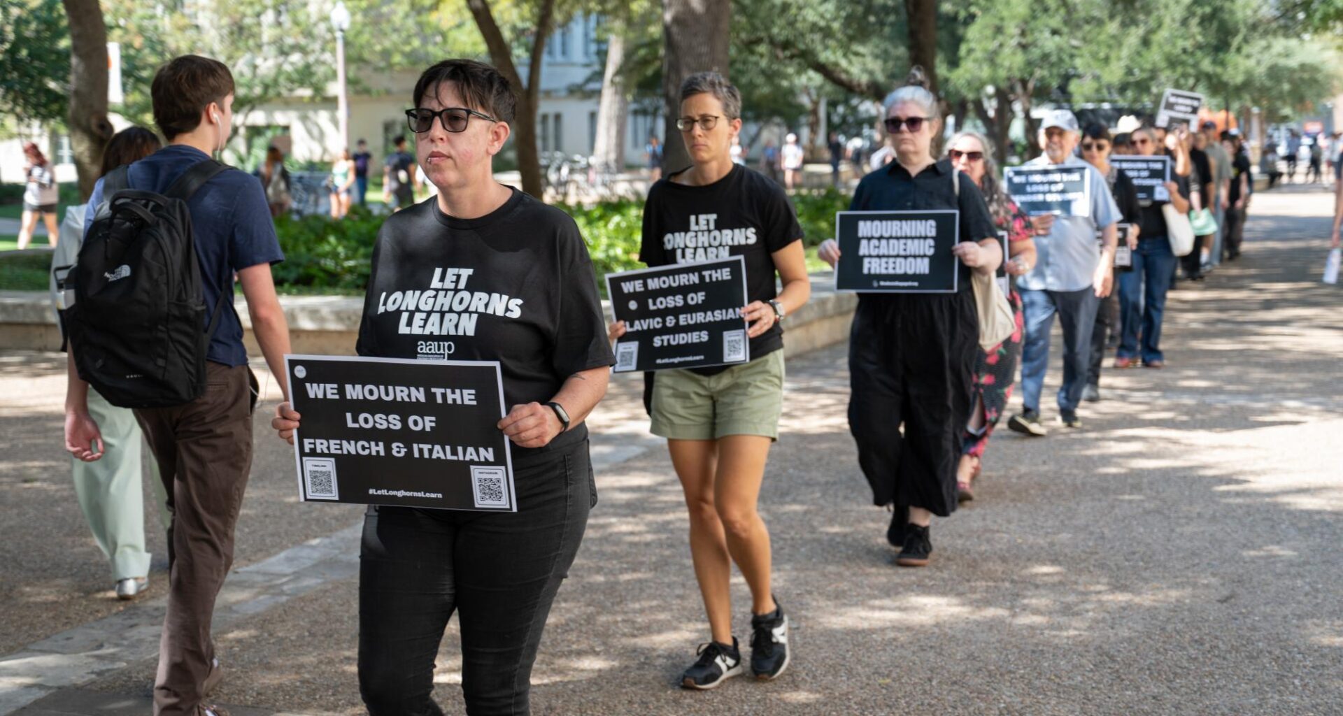 ‘Let Longhorns Learn’: UT professors protest COLA consolidations in 15-minute walks – The Daily Texan