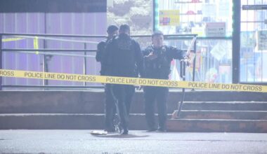 Man shot after gun fight breaks out in store parking lot