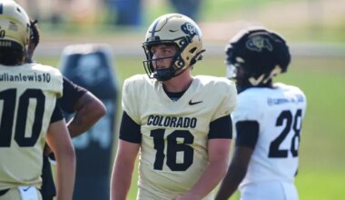 Colorado quarterback Isaac Wilson waits to take part in drills during a practice at an NCAA college football training camp in Fountain, Colo., Thursday, Aug. 6, 2026. (AP Photo/David Zalubowski)