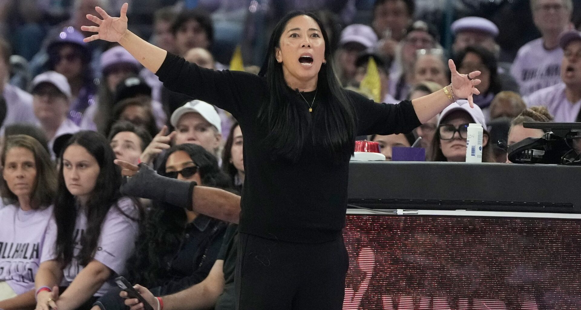Valkyries coach Nakase goes down on sideline late in Golden State's playoff-clinching win over Wings