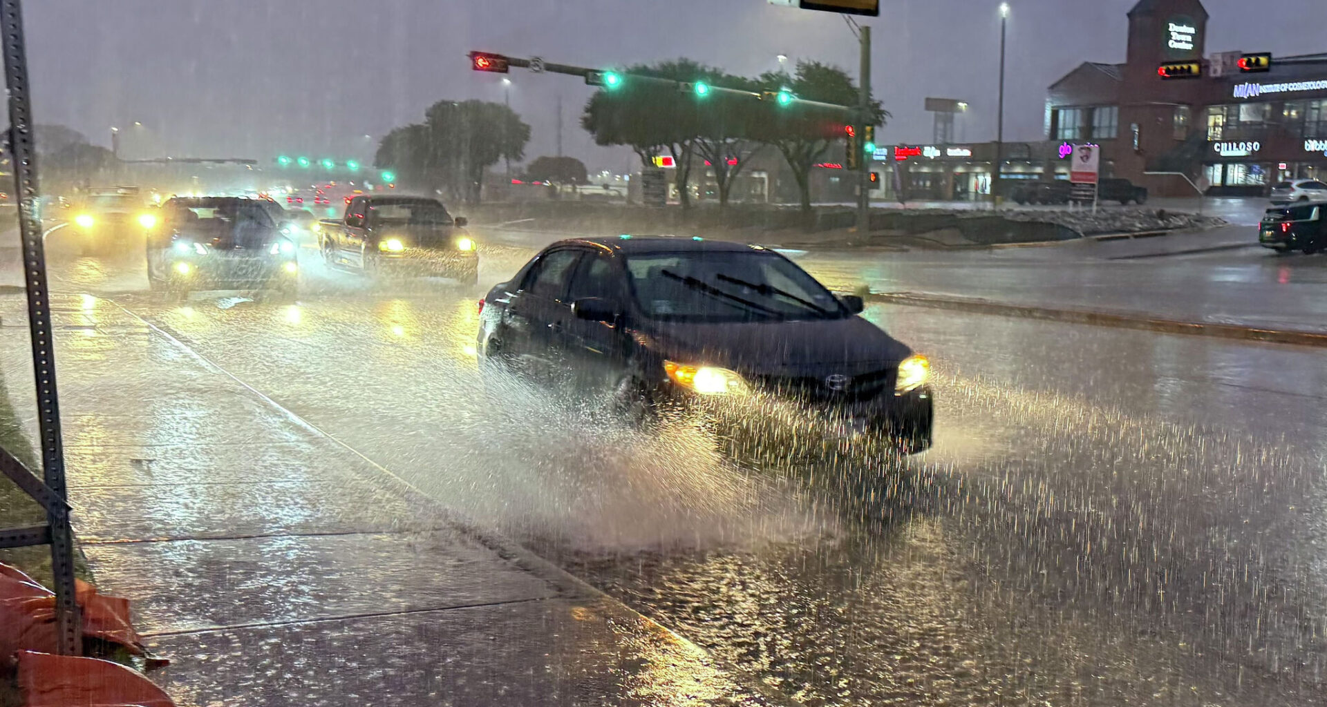 Vehicles drive in the rain on the State Highway Loop 288, Thursday, Oct. 1, 2026, in Denton.