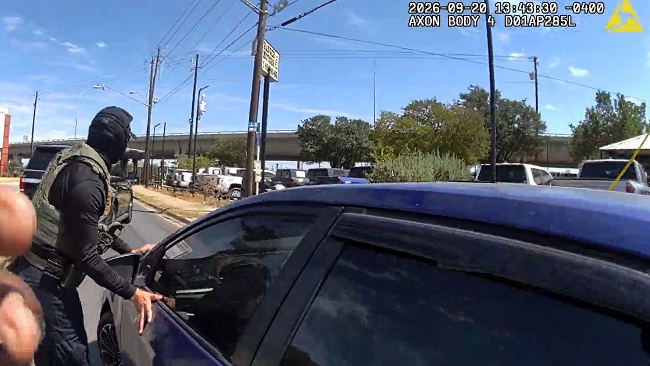 This image made from Immigration and Customs Enforcement (ICE) body camera footage shows an ICE officer stopping Wilber Rafael Garces Perez on Sunday, Sept. 20, 2026, in Austin, Texas. (Immigration and Customs Enforcement via AP)