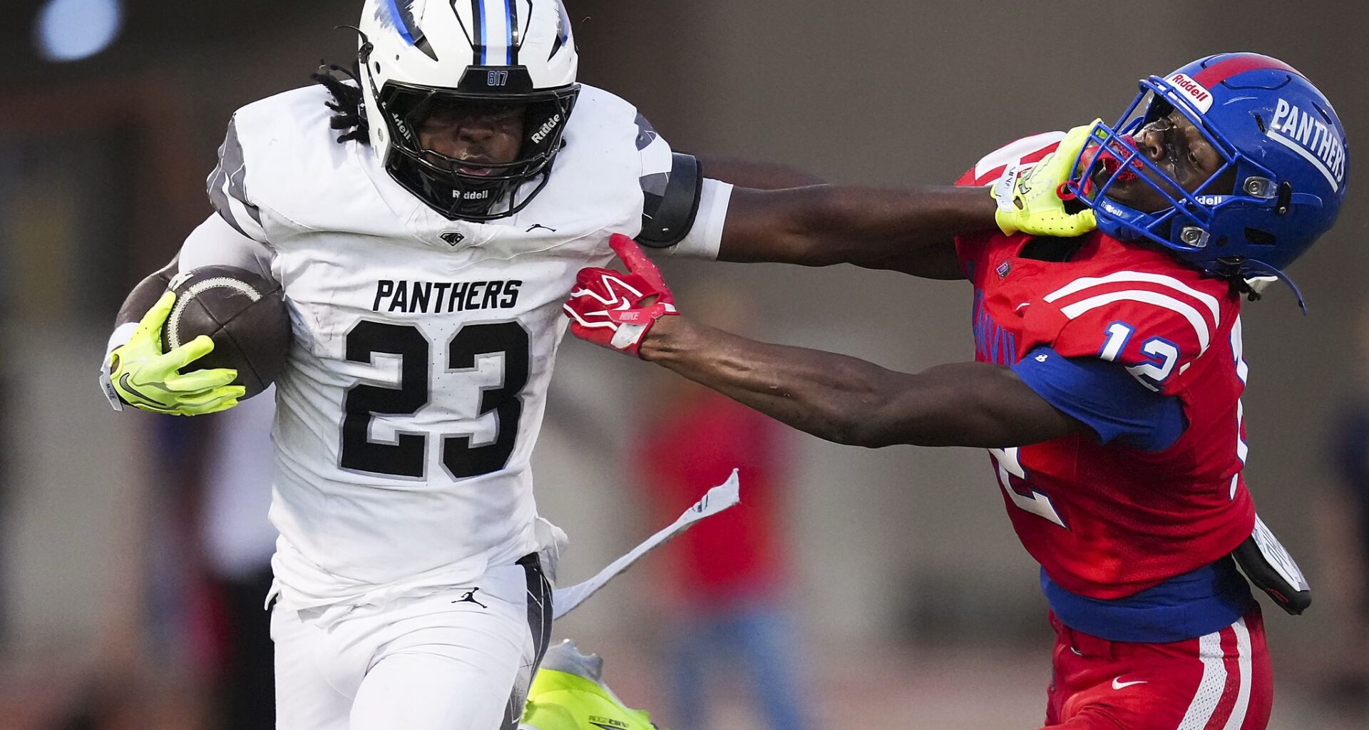 SMU running back Kendrick Raphael (6) stiff-arms Boston College defensive back Marcus Upton (5) during the first half of an NCAA college football game, Saturday, Oct. 3, 2026, in University Park.