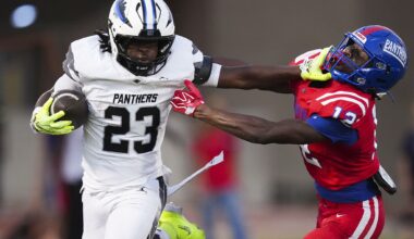 SMU running back Kendrick Raphael (6) stiff-arms Boston College defensive back Marcus Upton (5) during the first half of an NCAA college football game, Saturday, Oct. 3, 2026, in University Park.