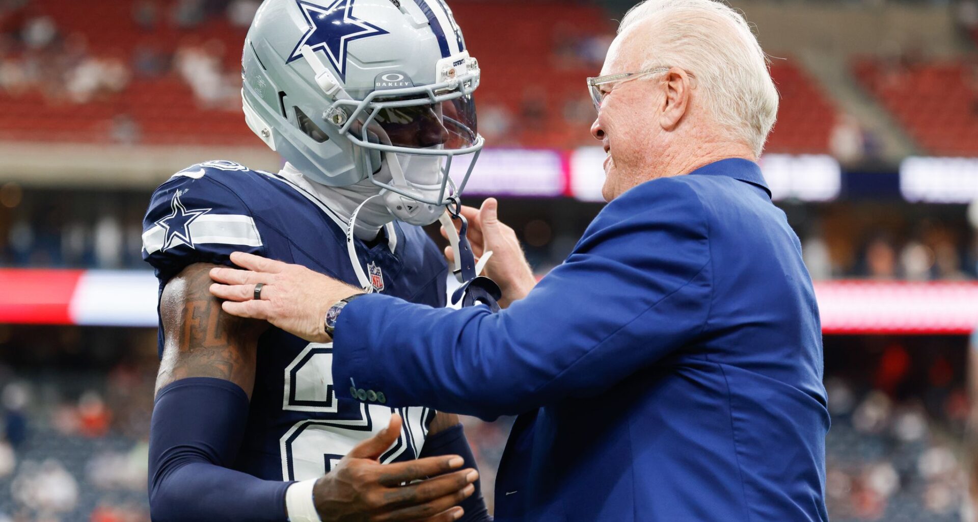 Dallas Cowboys head coach Brian Schottenheimer looks up at the screen during the first half of an NFL football game against the Houston Texans at Reliant Stadium in Houston, Sunday, Oct. 4, 2026.