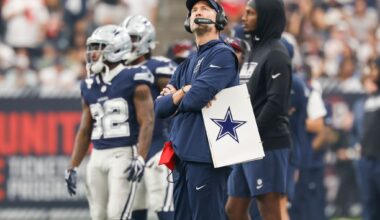 Dallas Cowboys head coach Brian Schottenheimer watches as his team warms up before an NFL football game against the Houston Texans at Reliant Stadium in Houston, Sunday, Oct. 4, 2026.