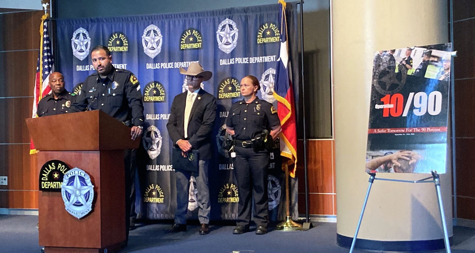 Dallas Police Senior Corporal Luis Mata speaks at the podium during a news conference about Operation 10/90 at the Dallas Police Department headquarters on Tuesday, October 6, 2026.