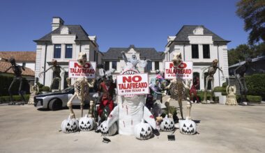 Anti-James Talarico political signage is displayed among Halloween decor in the driveway of a house along Deloache Avenue, Tuesday, Oct. 6, 2026, in Preston Hollow.